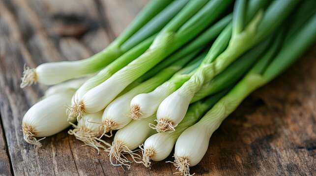 Fresh green onions placed on a rustic wooden table, highlighting their vibrant color and natural texture in a farmhouse-style setting