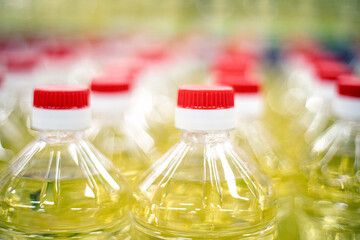 extra virgin vegetable oil in liter plastic bottles in the supermarket