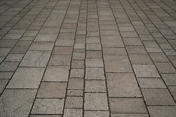 grey paving tile texture, grey tile pattern as background, grey tile texture close up	
