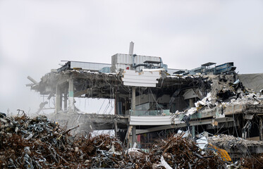 Dismantling of the building, construction work. Remains of the destroyed building.