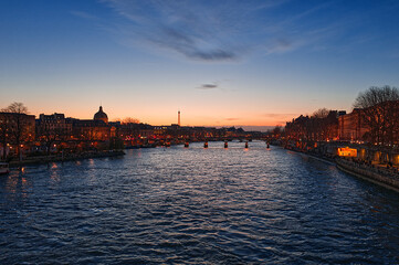 Fototapeta premium View on Seine, Louvre, Tour Eifel and Bridges in the Sunset in Paris