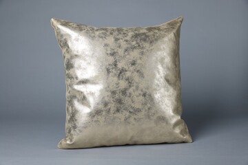 One soft decorative pillow on grey background