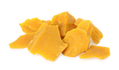Pieces of natural beeswax for making candles on white background