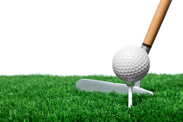Golf ball, tee, club and green grass against white background