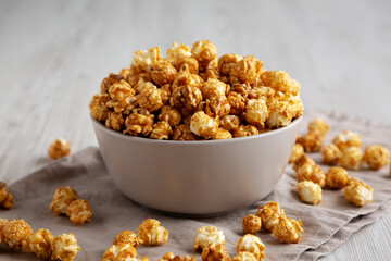 Homemade Caramel Popcorn in a Bowl, side view.