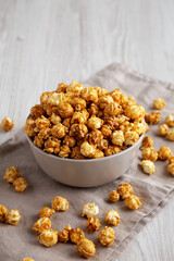 Homemade Caramel Popcorn in a Bowl, side view.