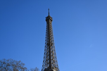 Eiffel Tower against the Blue Sky, Paris - 30 April, minimalist style without unnecessary objects 