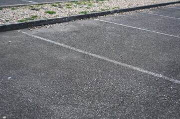 white arrow on gray asphalt, turn left, turn right, abstract white lines on asphalt, background of asphalt texture and white lines	
