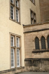 Historic government building entrance in Luxembourg City. Elegant stone doorway with columns and arched wooden door — example of European architecture and civic heritage.