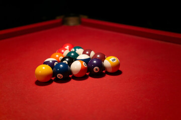 Racked biliard balls on biliard table