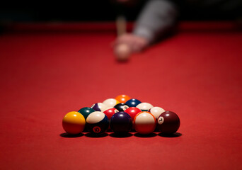 Racked biliard balls on biliard table