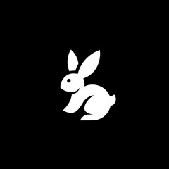 Obraz premium Minimalist white rabbit icon on black background showcasing modern design principles in vector format