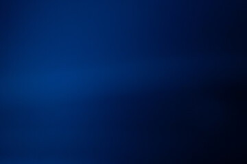 A smooth, rich blue gradient background with soft tonal transitions, creating a minimal and...