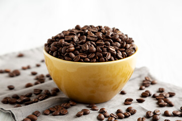 Organic Roasted Coffee Beans in a Bowl, side view.
