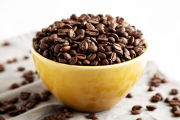 Organic Roasted Coffee Beans in a Bowl, side view.