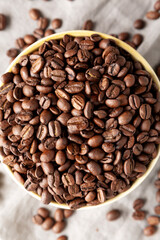 Organic Roasted Coffee Beans in a Bowl, top view.