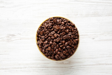 Organic Roasted Coffee Beans in a Bowl, top view.
