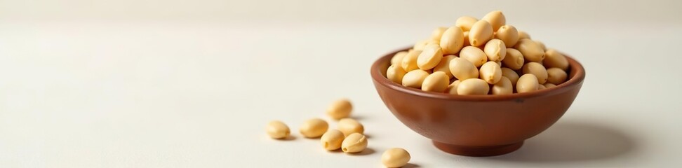Small bowl of dried soya beans on light background,  healthy,  diet