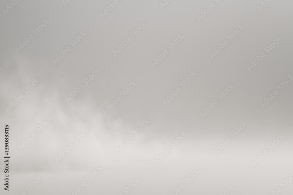 Poster white smoke is fading on empty background with copy space, creating a mysterious and ethereal atmosp