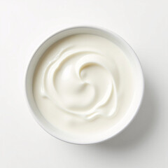 Swirl of sour cream in bowl isolated on white background with clipping path, fresh greek yogurt