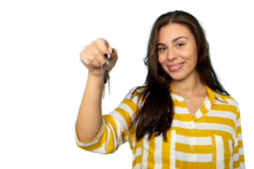 Cheerful female grasping new house keys, smiling brightly