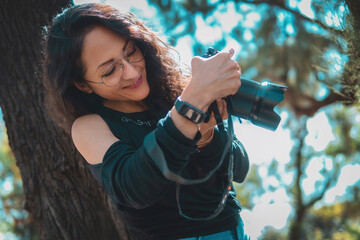 Photographer taking pictures outside, professional photographer, concept for world photography day, copy space