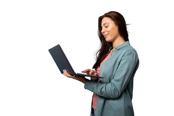 Young woman smiling and using laptop, working remotely with transparent background