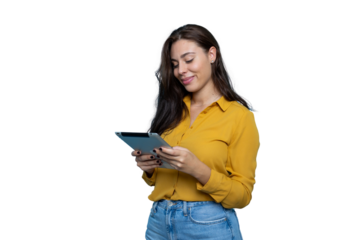 Young woman in yellow shirt browsing digital tablet, long brown hair flowing, transparent backdrop