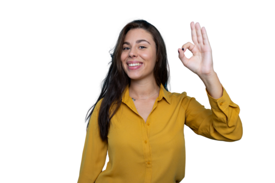 Young businesswoman smiling and gesturing okay sign, isolated on transparent background