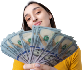 Photo of a wealthy woman in simple clothes holding a fan of dollar money isolated against a concrete wall background