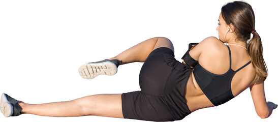 A young slim athletic girl in sportswear with snakeskin prints performs a set of exercises. Fitness...