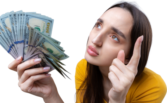 Photo of a wealthy woman in simple clothes holding a fan of dollar money isolated against a concrete wall background
