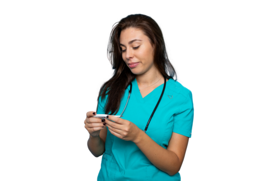 Young female doctor in turquoise scrubs holding a digital thermometer, checking temperature