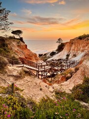 Wooden steps descending to Falesia beach near Vilamoura and Albufeira in Portugal 