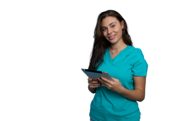 Young female doctor wearing teal scrubs holding a tablet and smiling on a transparent background