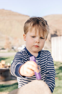 A young toddler enjoys a camping tr