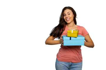 Happy young woman holding two gift boxes, a small gold one and a bigger light blue one, smiling on a transparent background