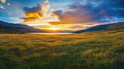 Fototapeta premium A breathtaking sunset over a serene lake surrounded by rolling hills. with golden fields in the foreground and dramatic clouds enhancing the tranquil atmosphere