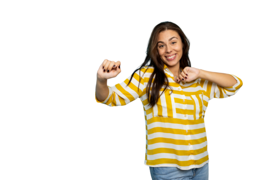 Cheerful woman dancing, expressing joy with vibrant movement