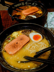 Jakarta, Indonesia - April 8, 2025: Ramen noodles with bacon and egg