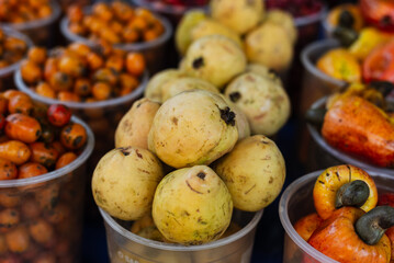 Fruits for sale at a market. Source of nutrients and vitamins.
