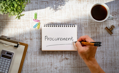 There is notebook with the word Procurement. It is as an eye-catching image.