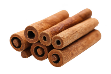 A close up view of several cinnamon sticks stacked together well on transparent background
