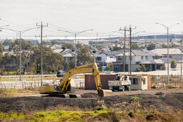 Excavator at a construction site in the outer Melbourne suburb of Truganina, with new residential...