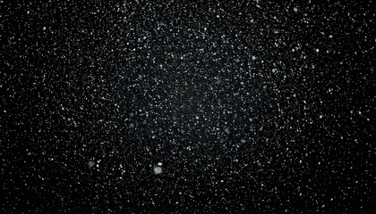 Obraz premium Falling snow against black background