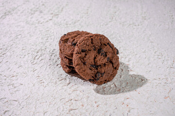 Tasty Homemade Chocolate Cookies Arranged In A Neat Stack, Displaying The Perfect Balance Of Crunch And Softness On A Clean Background.