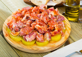 Orejas a la gallega - spanish dish. Roast pigs ears with spice. High quality photo