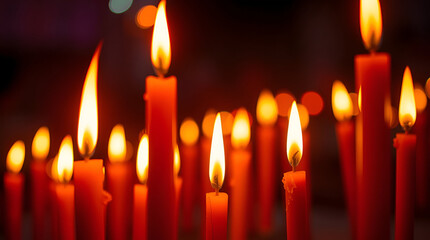 Glowing Red Candles in a Serene Dark Setting