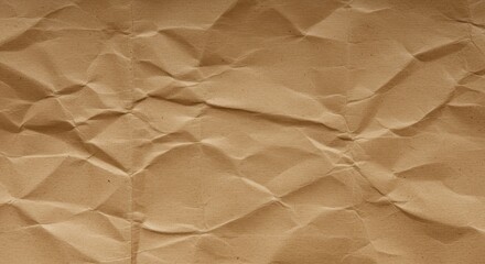 Obraz premium Close up shot of brown crumpled paper showing the texture and shadows across the entire surface