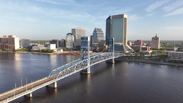 Cityscape aerial view from San Marco and downtown Jacksonville, Florida, on a beautiful blue-sky spring day, with the river, and tall buildings.